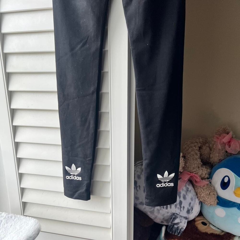 Black adidas leggings with trefoil logo on back